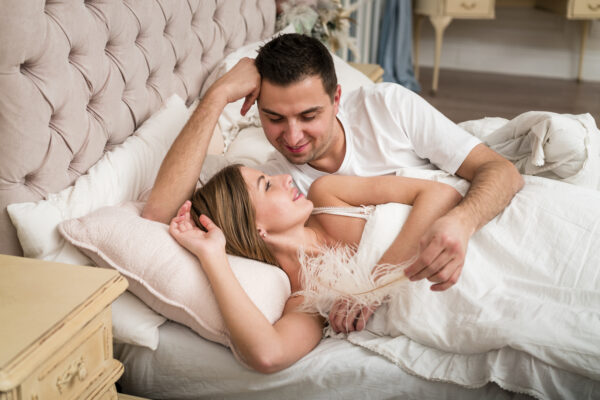 couple romance on bed